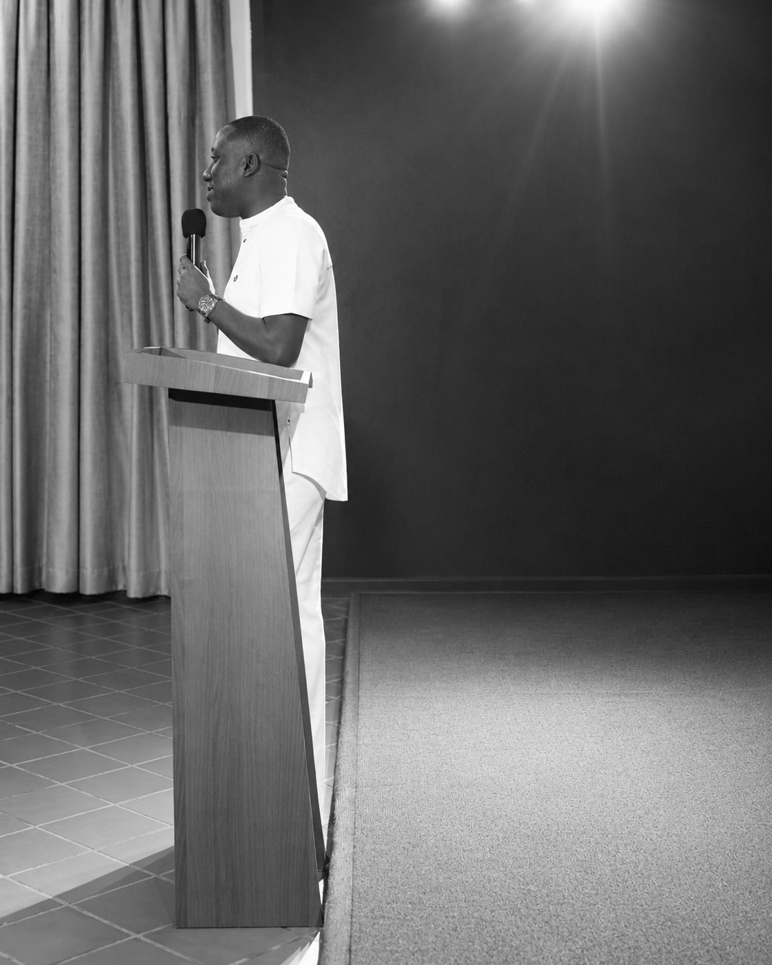 The founder of Truth Unveiled Ministries preaching from the pulpit
